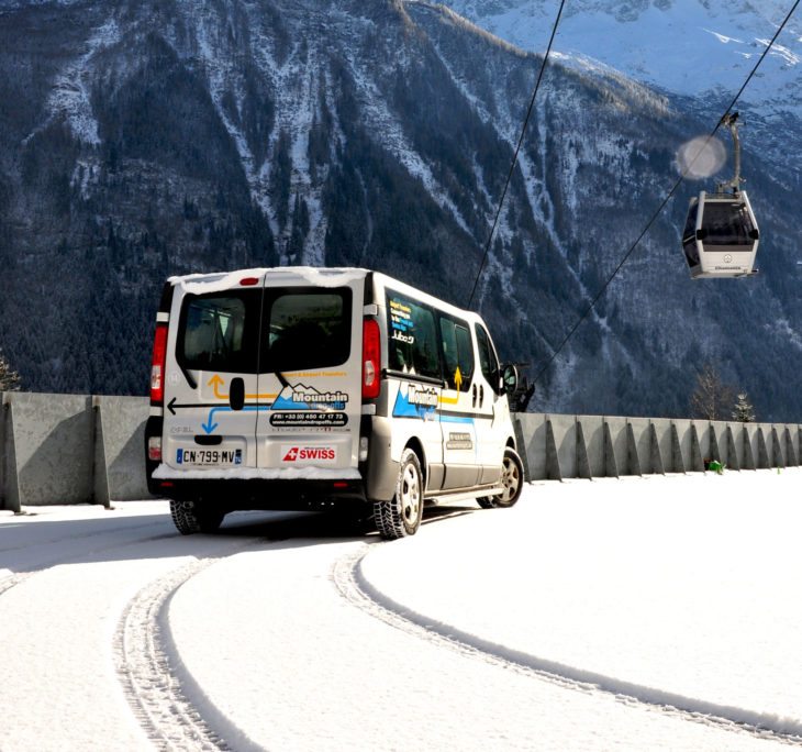 Airport transfers bus in the winter snow